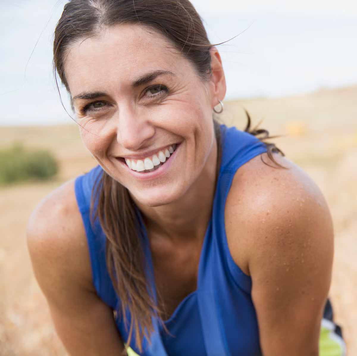 files/pretty-woman-smiling-after-outdoor-run-royalty-free-image-1567772764.avif